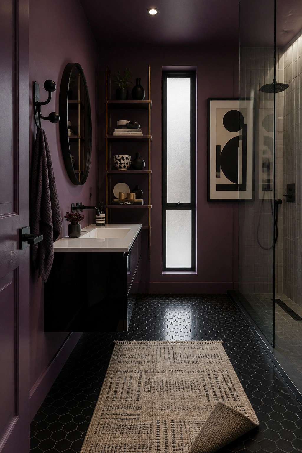Modern purple bathroom with black hex tiles, white vanity, and curled woven rug