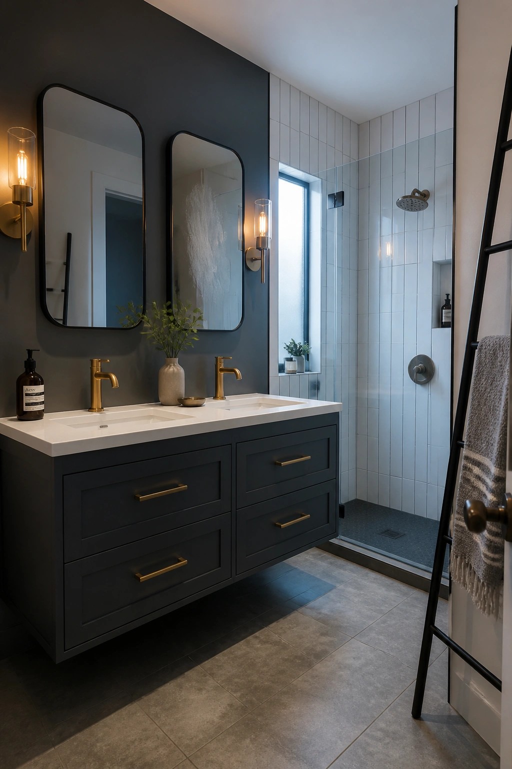 Modern bathroom with dark floating vanity, gold fixtures, and tiled shower.