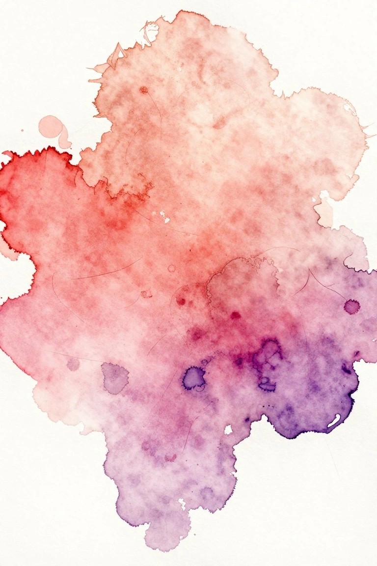 Abstract watercolor blending red, pink, and purple hues with soft, irregular edges.