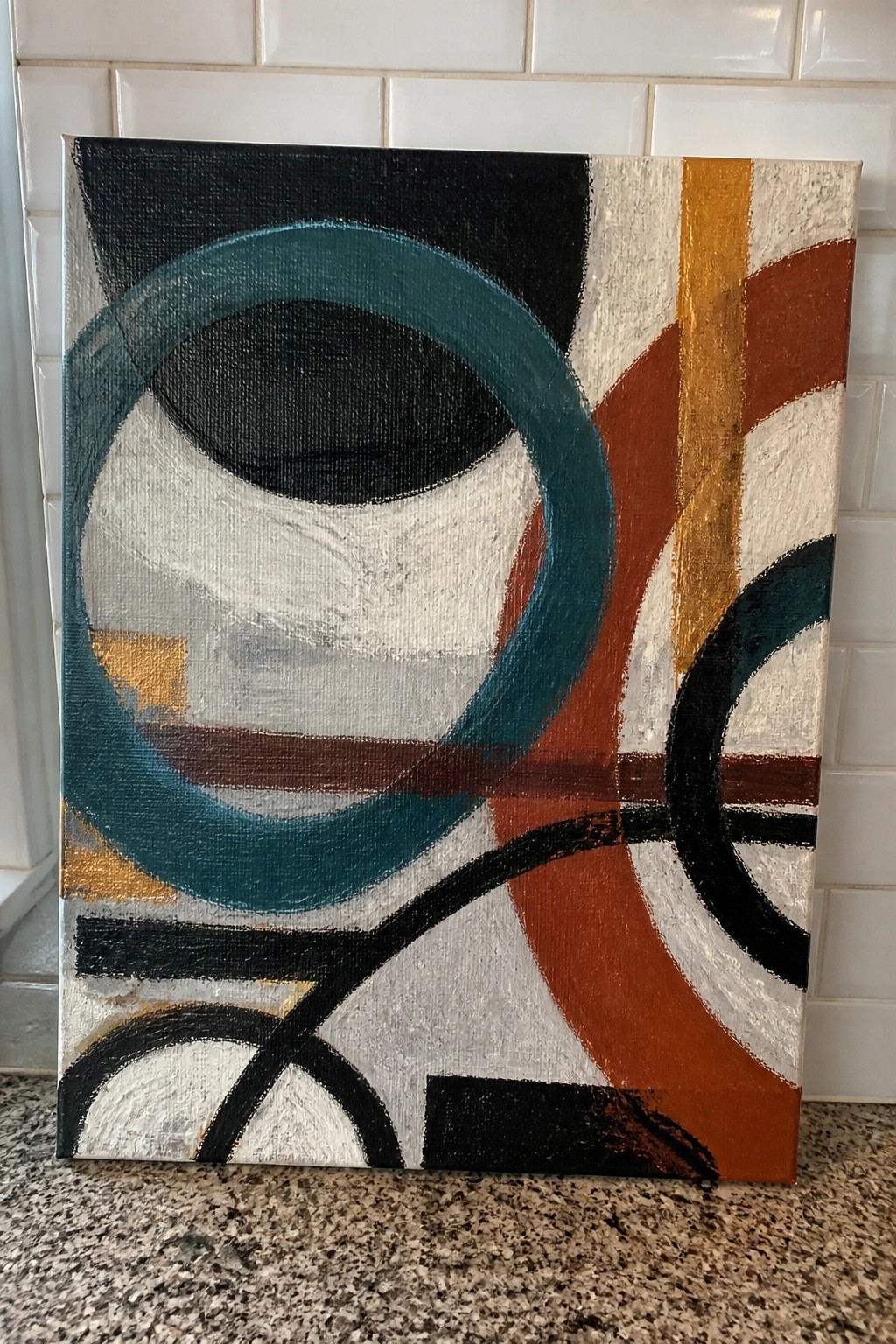 Abstract acrylic painting on canvas with overlapping teal, black, rust, and white curved and angular shapes.