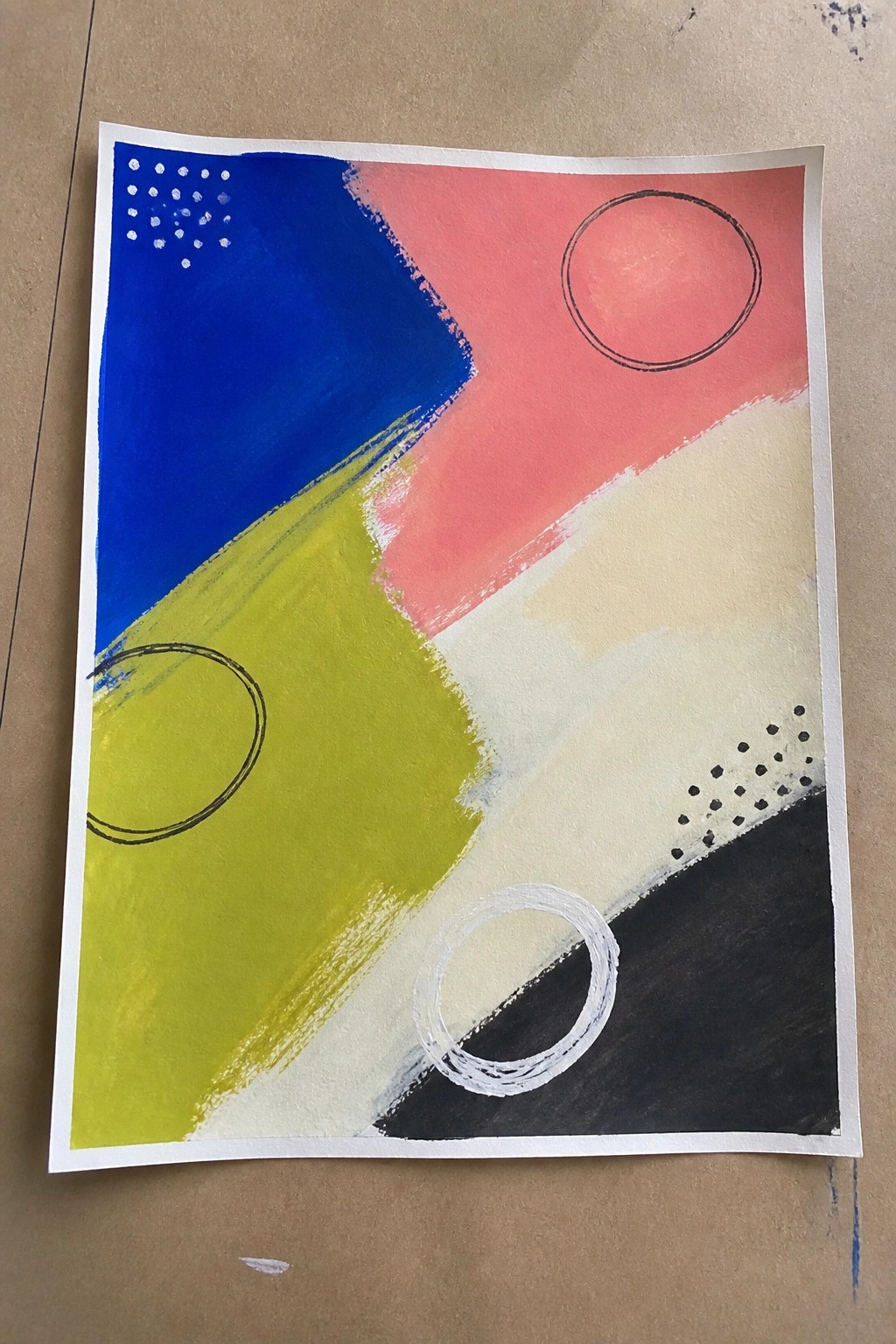Abstract painting with blue, pink, yellow, beige, black sections, circles, and dots.