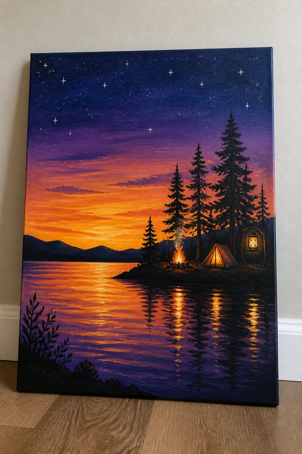 A painting of a lake at sunset with a campfire, tent, and pine trees reflected in the water under a starry sky.