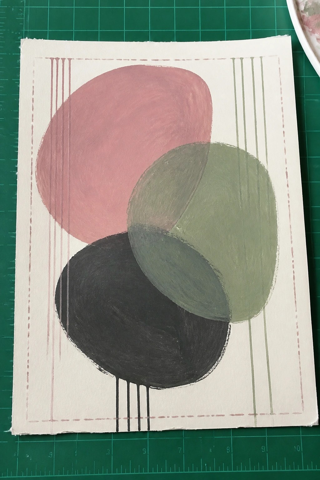 Abstract painting of overlapping pink, black, and green circles with vertical lines and drips