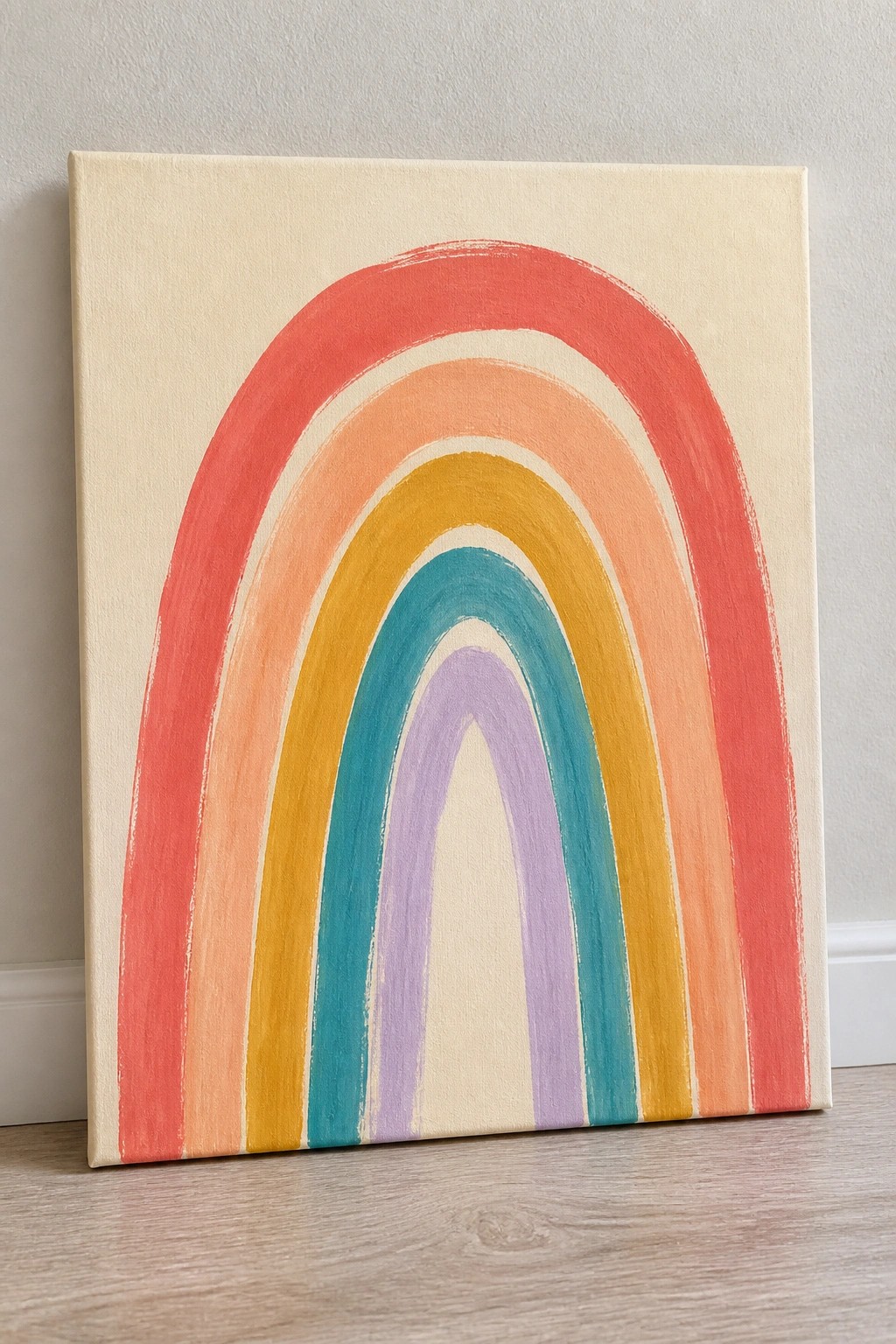 Vibrant rainbow painting on canvas with red, orange, yellow, teal and purple arches.