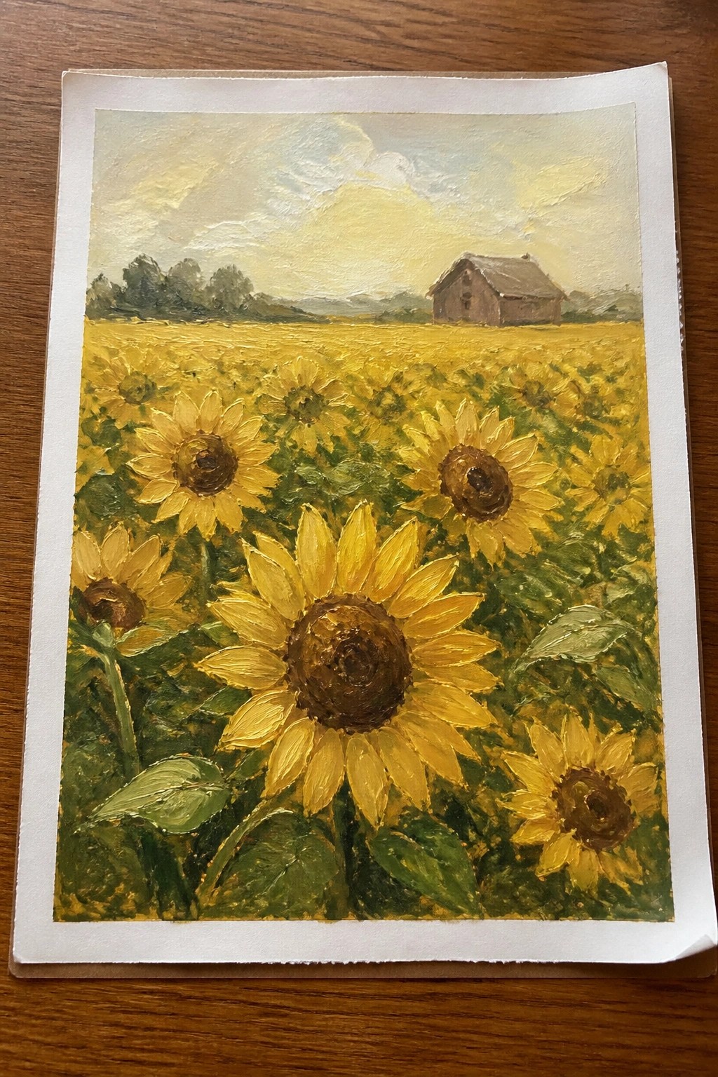Vibrant oil painting of yellow sunflowers blooming in a golden field with a barn.
