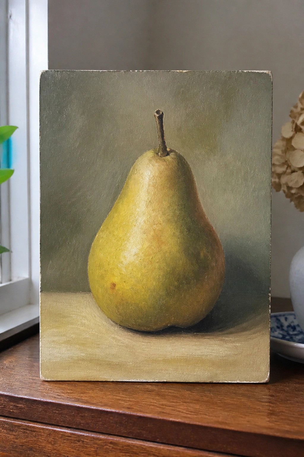 Realistic still-life painting of a single green pear on a pale surface