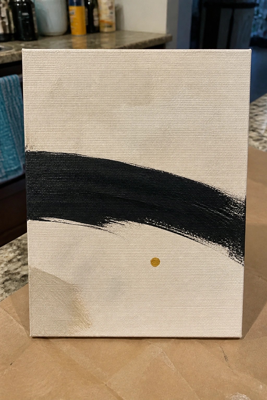 Abstract canvas with black curved stroke, small gold dot on white background