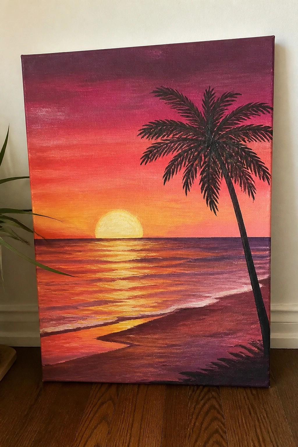 Vibrant sunset painting with silhouetted palm tree over glowing ocean waves