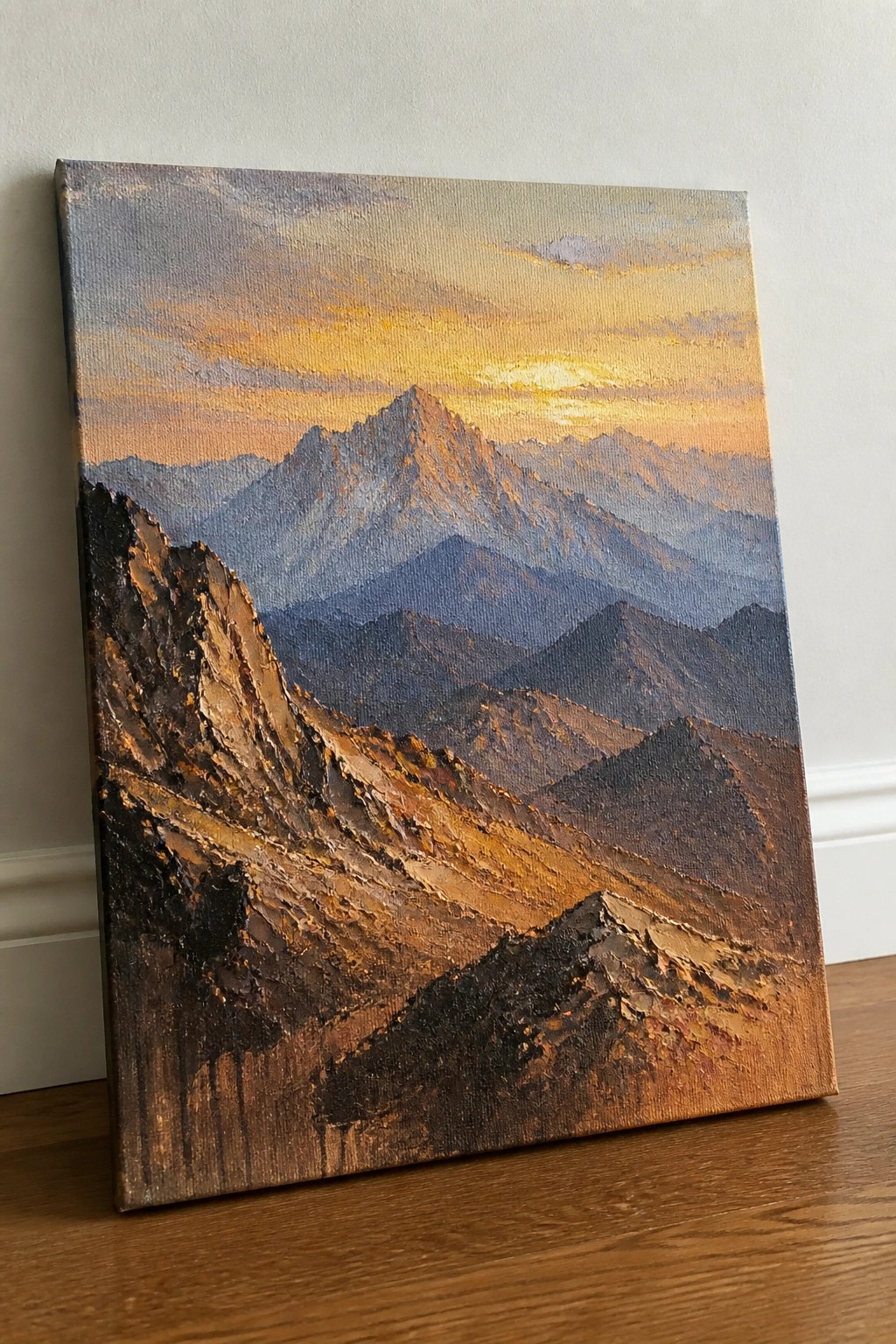 Textured oil painting of rugged mountains glowing under a vibrant orange sunset sky.