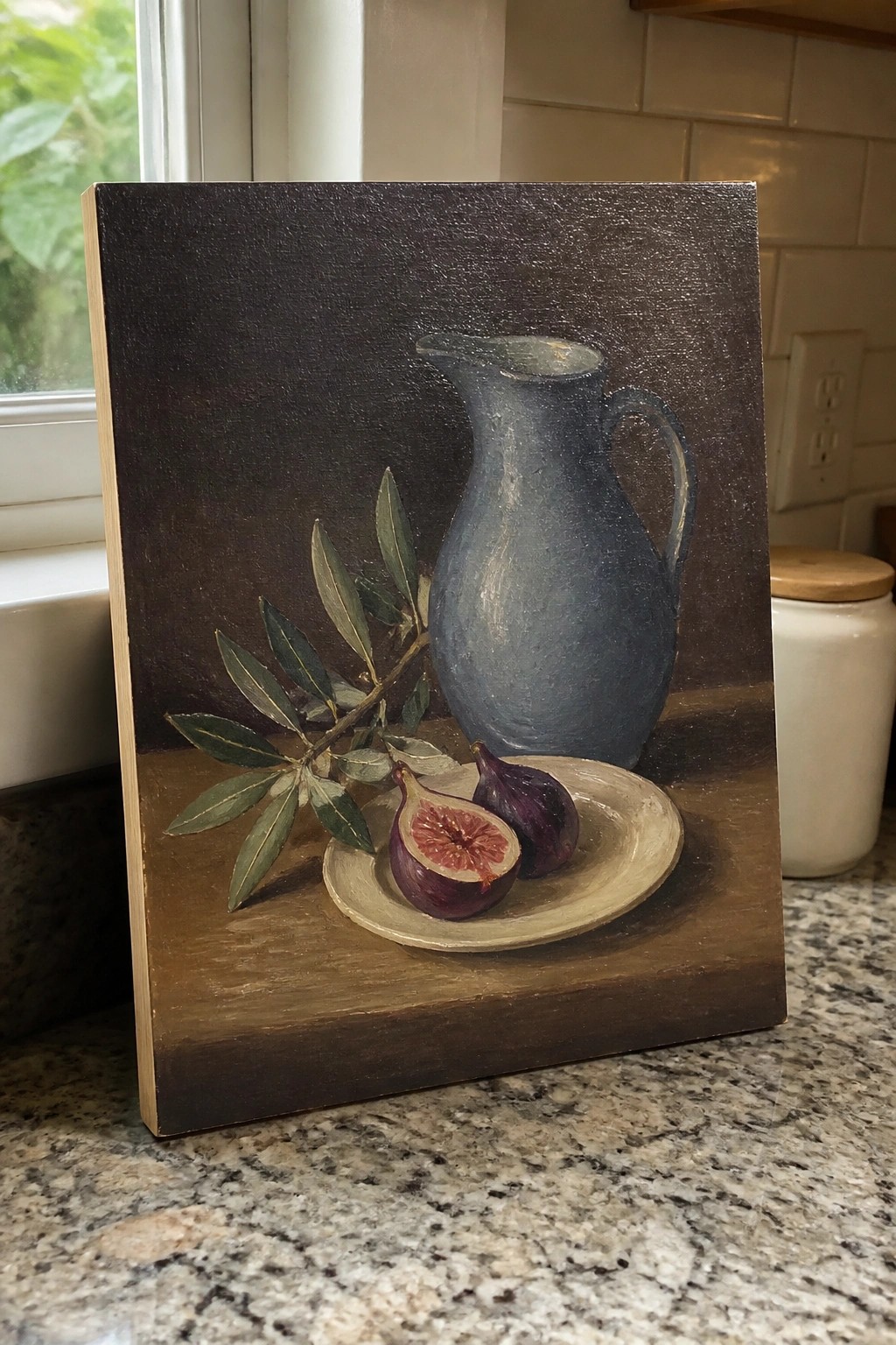 Blue pitcher, halved figs on plate, olive branch on wooden table still life painting