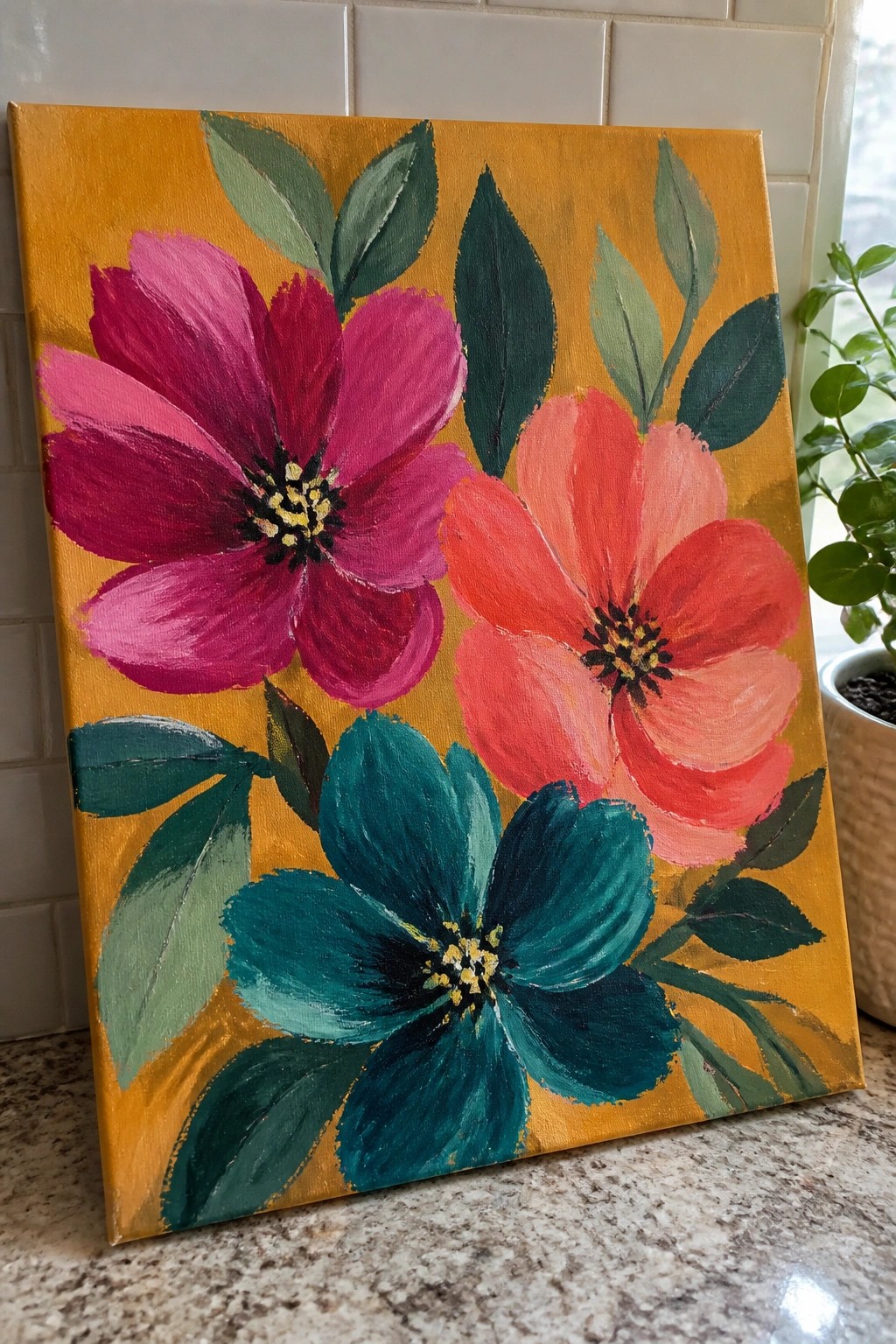 Vibrant painting of magenta, coral, and teal flowers with green leaves on yellow background