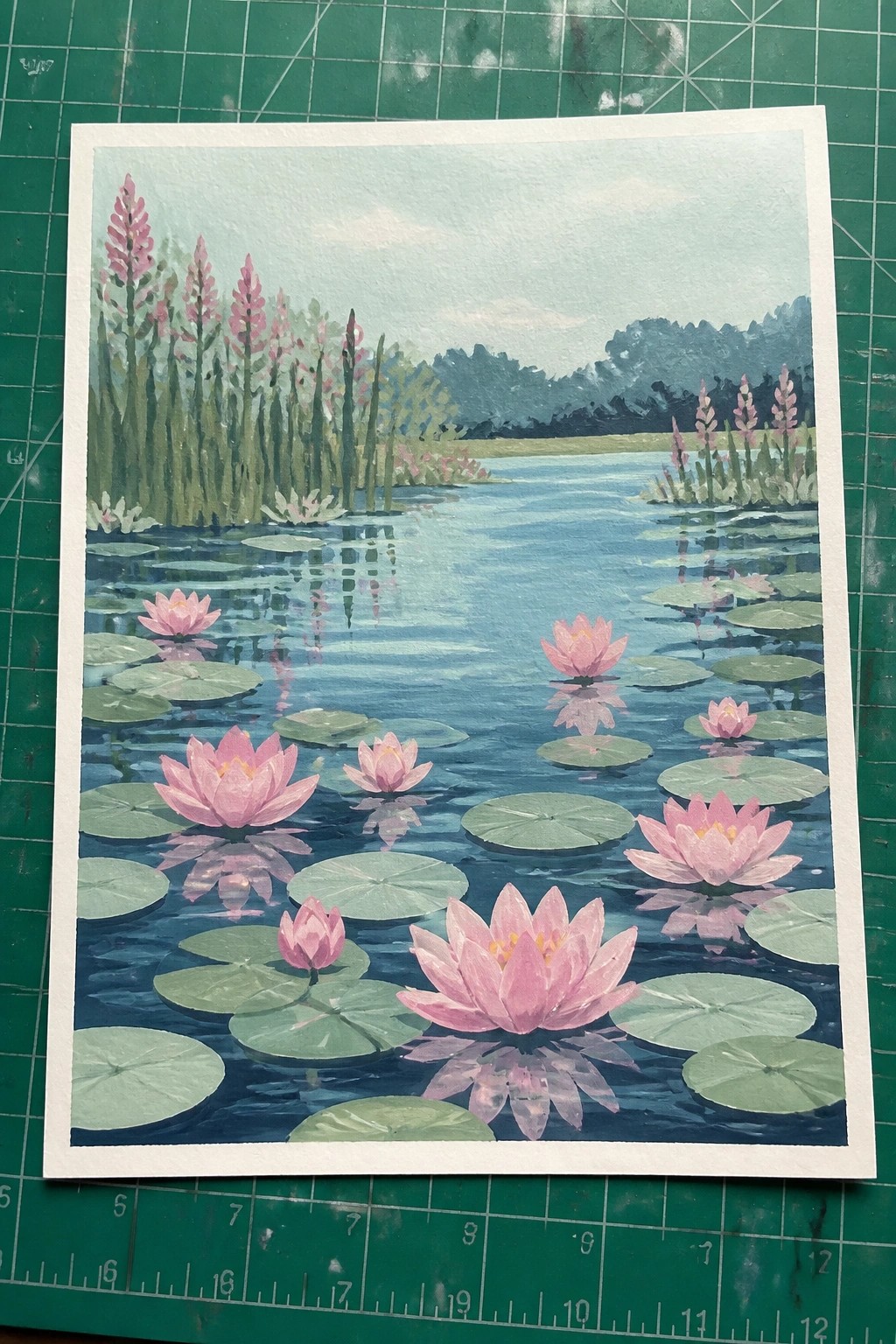 Watercolor painting of pink water lilies blooming on a reflective blue pond with lily pads