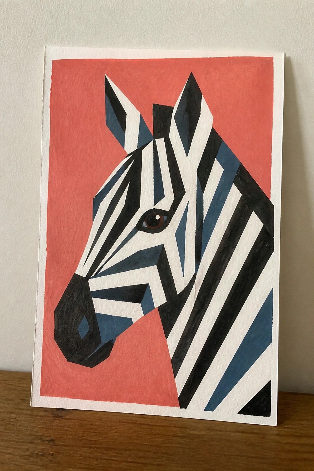 Geometric zebra head painting with black white blue stripes on red background