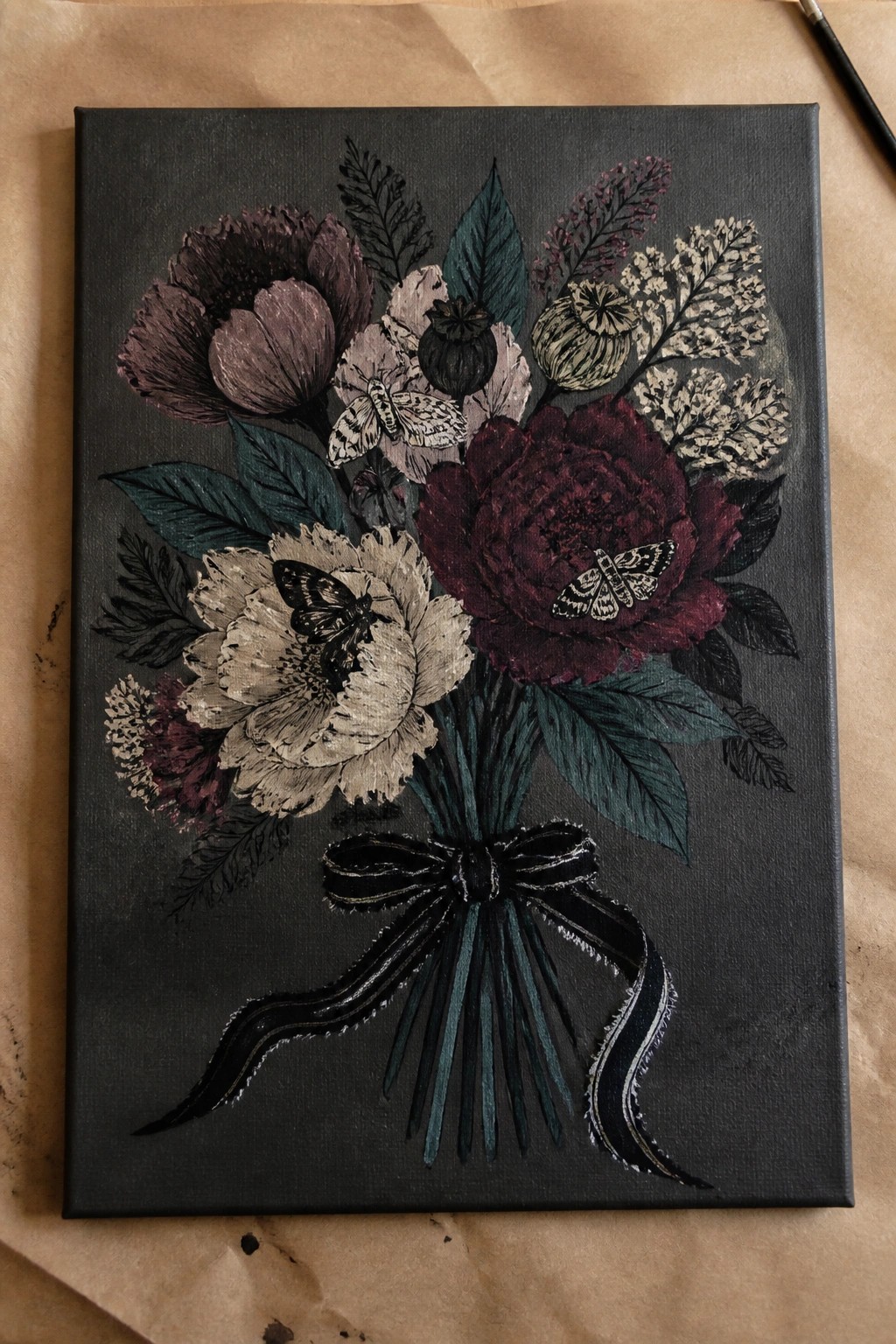 Dark floral bouquet painting with peonies, poppies, moths, and black velvet bow on canvas