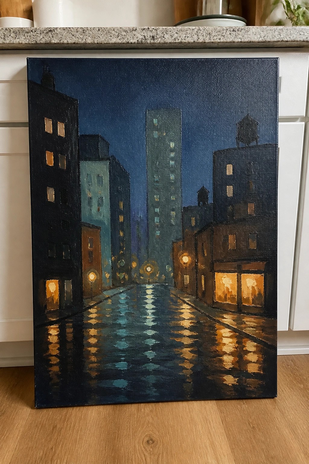 Nighttime city painting with wet street, glowing lamps, and building reflections.