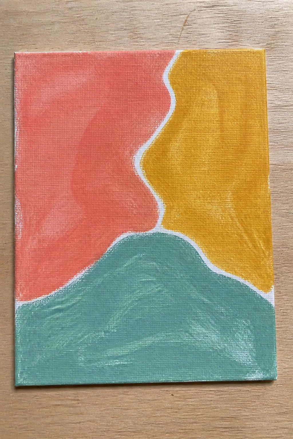 Abstract painting with red, yellow, and green wavy sections separated by white lines on canvas.