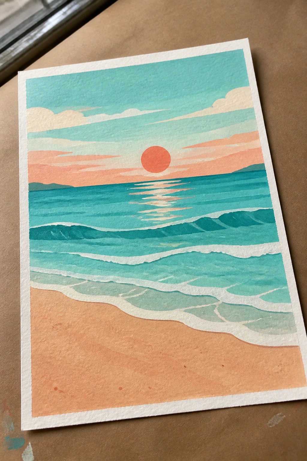 Watercolor painting of orange sun over teal ocean waves lapping onto sandy beach