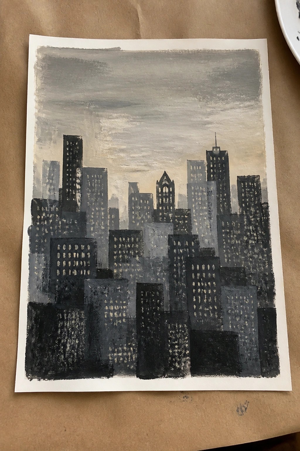 Abstract painting of dark city skyline with glowing windows under overcast sky.