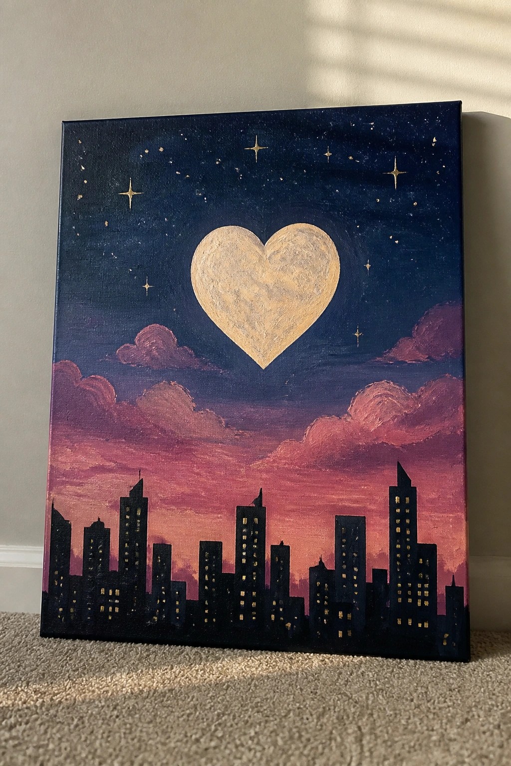 Glowing heart in starry blue sky above pink clouds and city skyline
