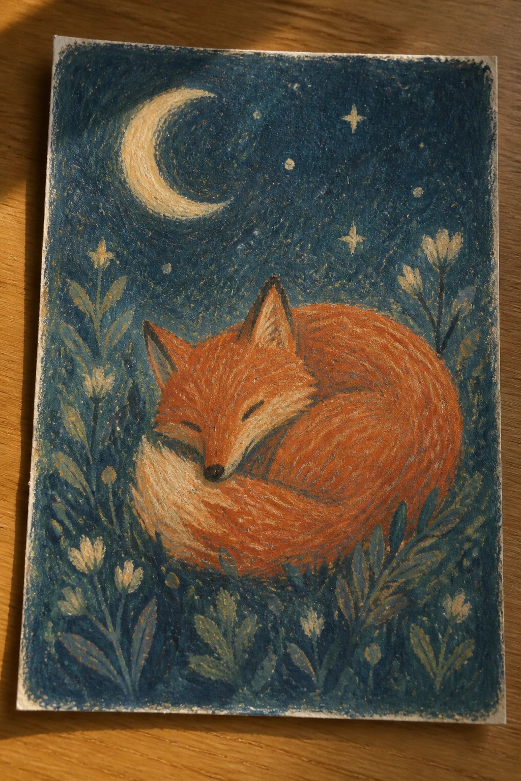Sleeping orange fox curled among flowers beneath crescent moon and stars in night sky