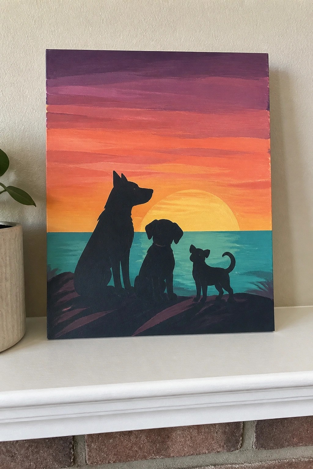 Three black dog silhouettes on rocks face a sunset over turquoise water in a painted canvas scene.