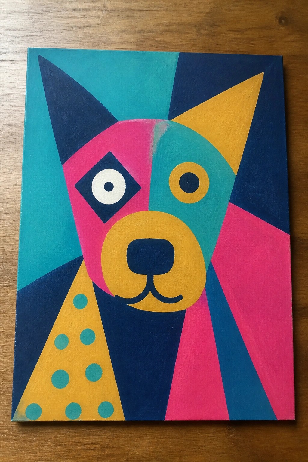 Colorful geometric abstract dog face painting with mismatched eyes and polka dots.