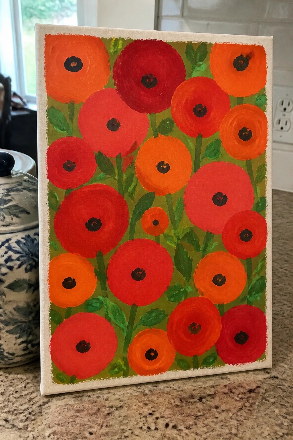 Vibrant painting of red and orange poppies with dark centers on green stems and leaves