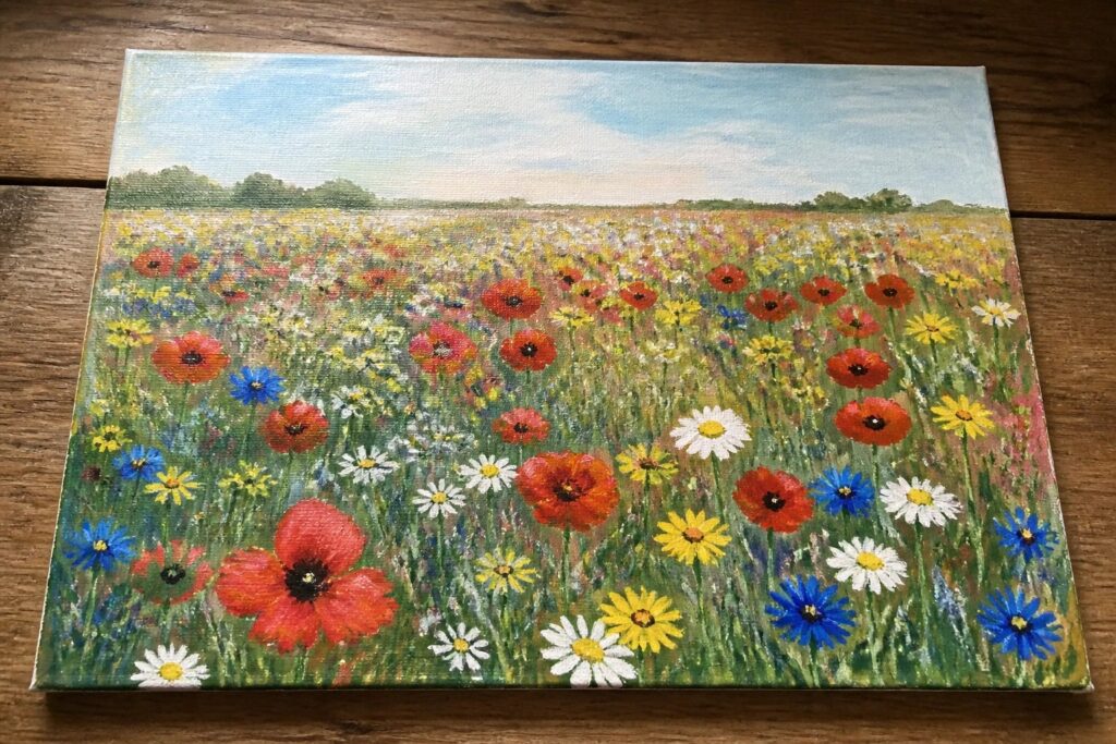 21 Colorful Wildflower Painting Ideas Inspired by Natural Meadows Vibrant wildflower meadow painting with red poppies, white daisies on canvas over wood