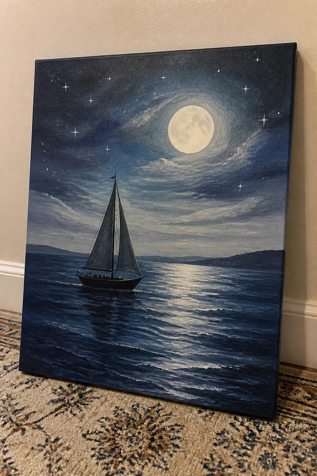 Realistic painting of dark sailboat on moonlit blue ocean waves under starry night sky.