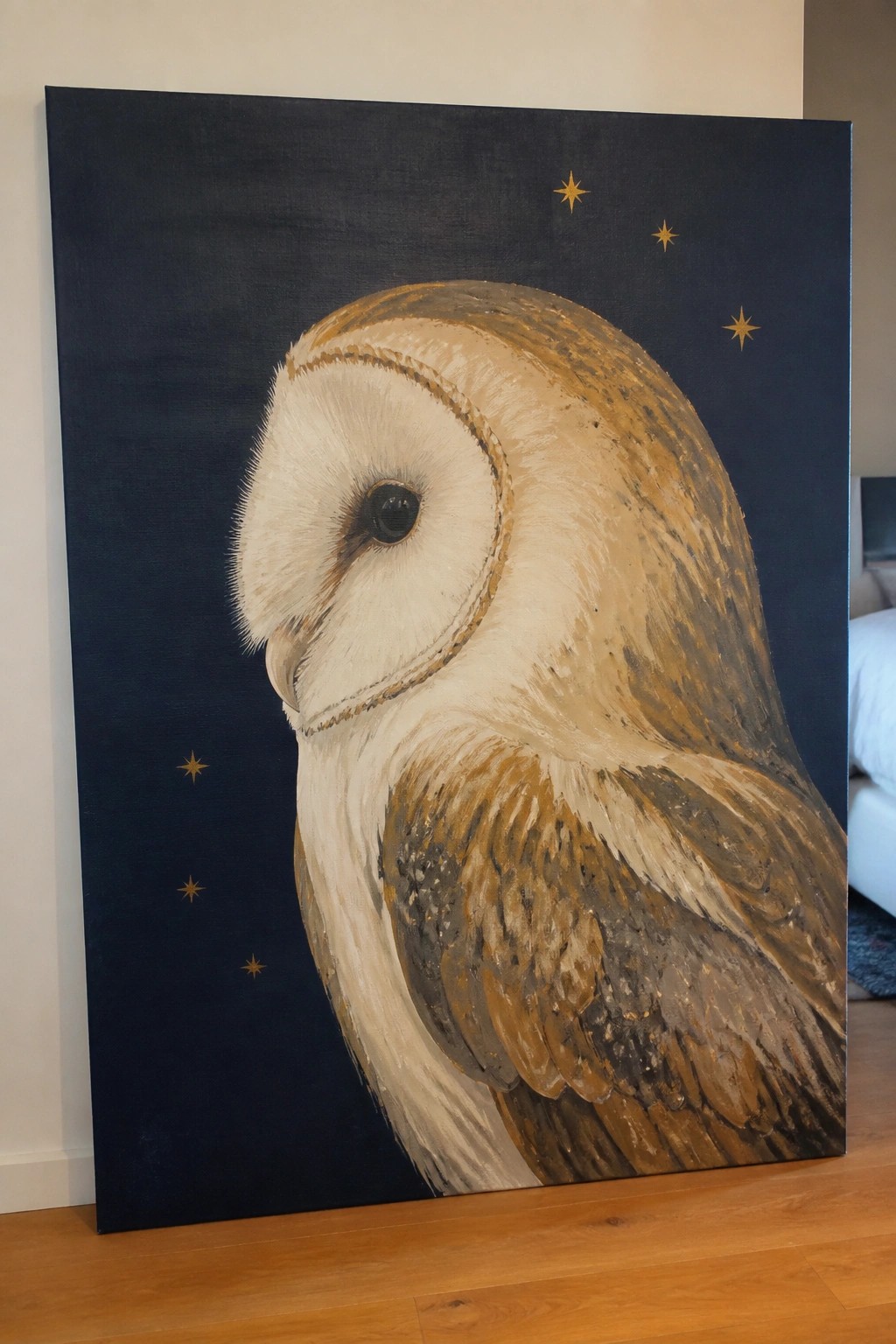 Large barn owl painting with white face, brown feathers on dark blue starry background