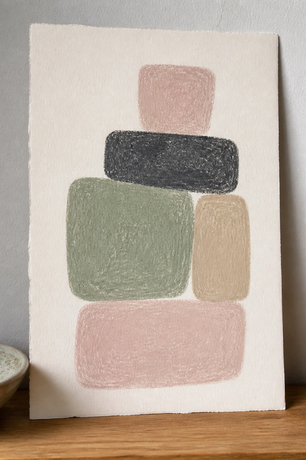 A minimalist abstract painting with overlapping rounded rectangles in soft pink, black, green, and beige on a cream background.