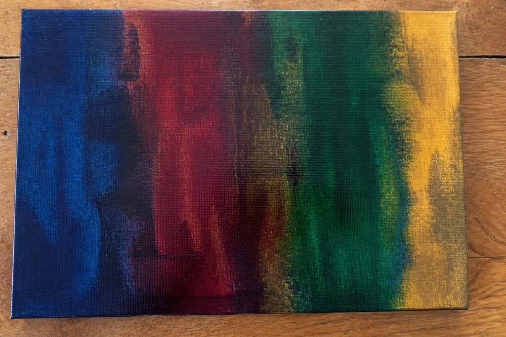 21 Moody Abstract Painting Ideas in Deep Colors and Soft Edges Abstract canvas with vertical streaks of blue, red, green, and gold paint on wood.