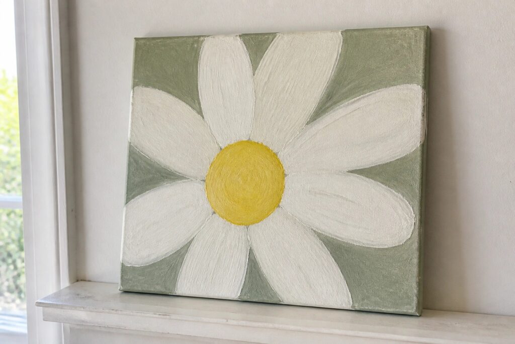 Painting of white daisy with yellow center on green canvas background