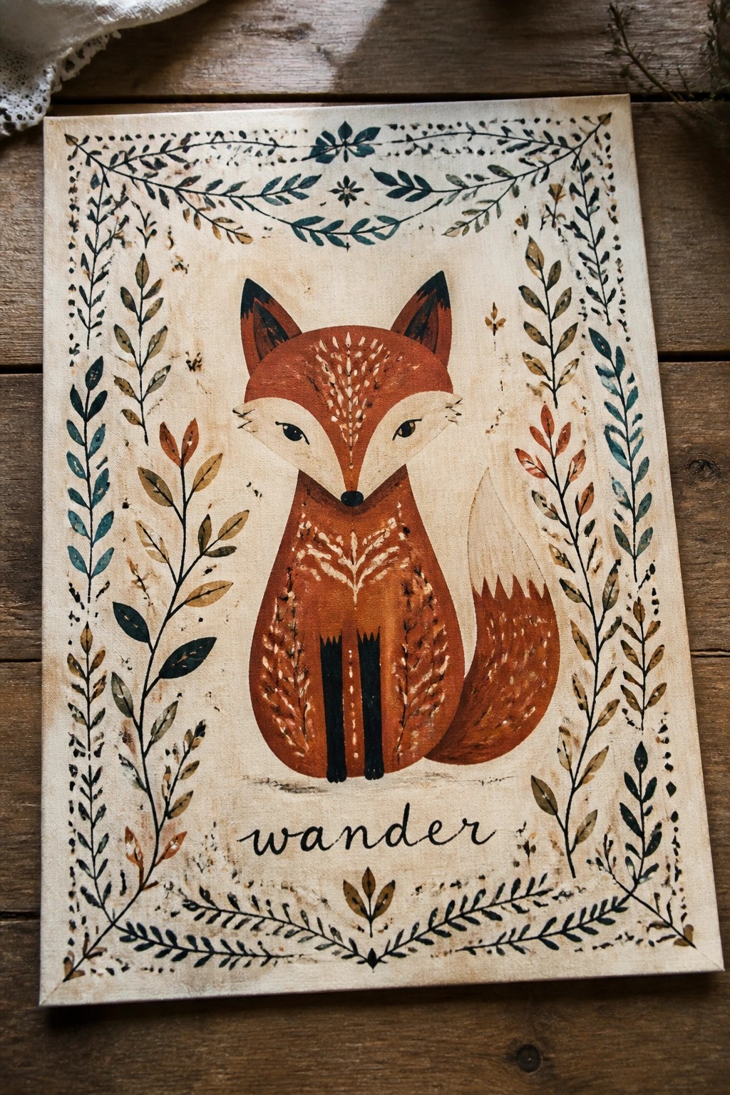 Folk-art fox with leaf vines and wander text on distressed canvas border