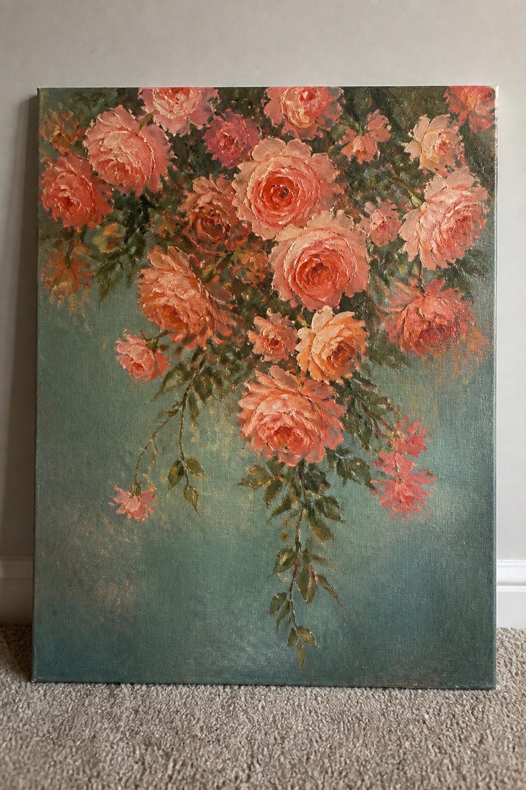 Oil painting of cascading pink and coral roses on a teal background.