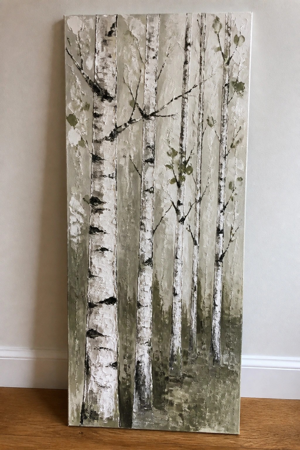 Textured painting of white birch tree trunks with black branches and green foliage