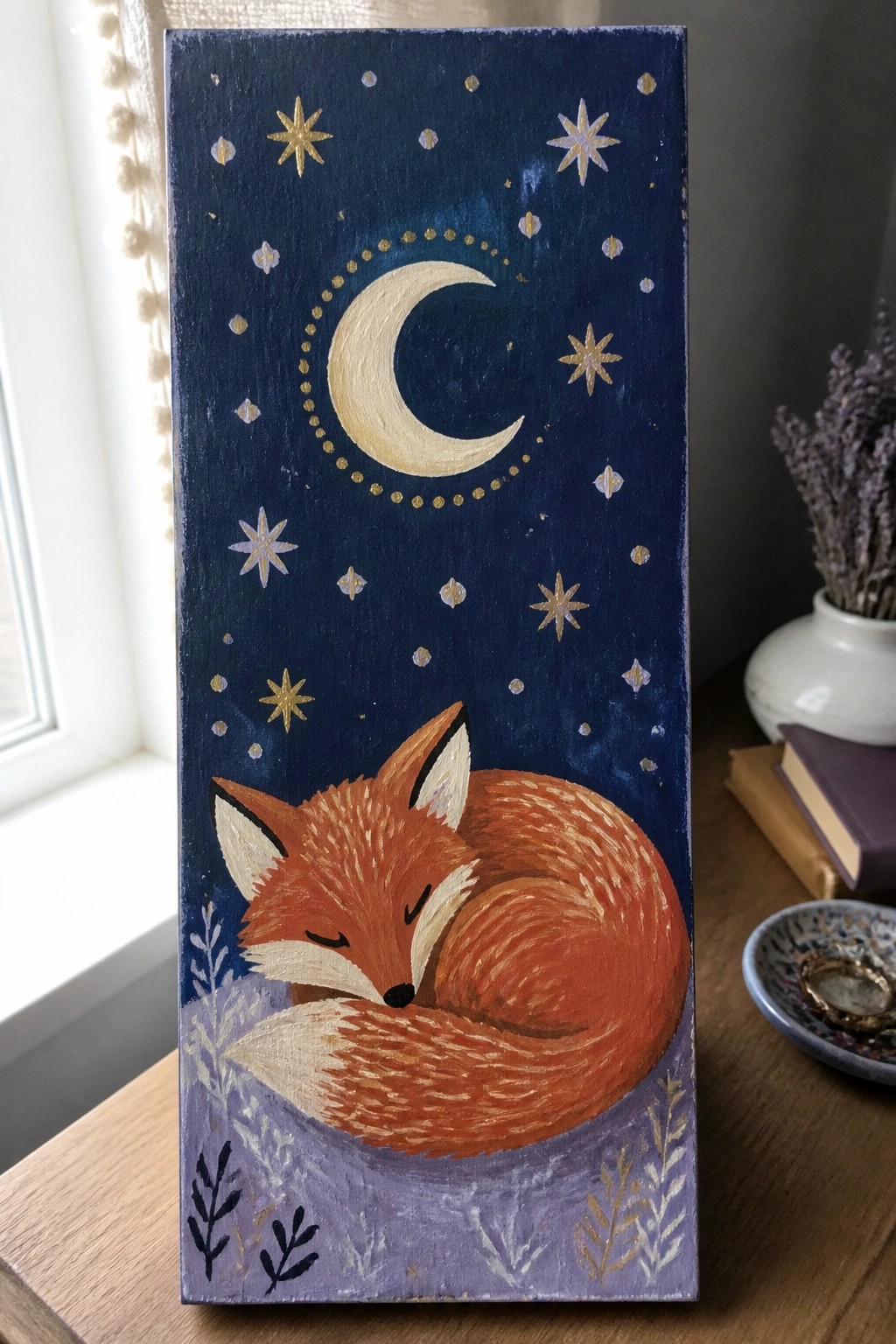 Vertical wooden panel with sleeping curled fox under crescent moon and gold stars