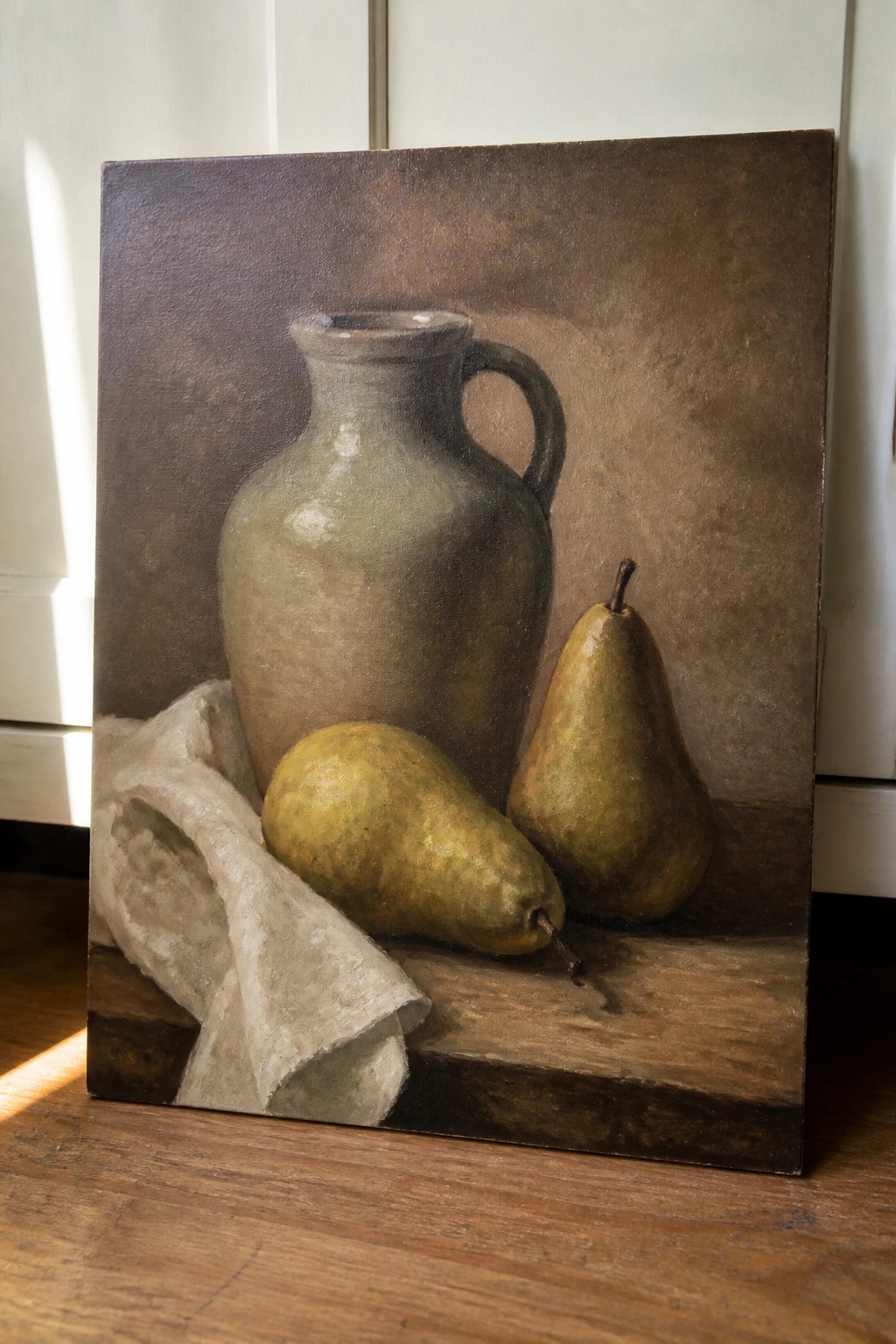 Still life painting of green jug, two pears, and white cloth on wood.