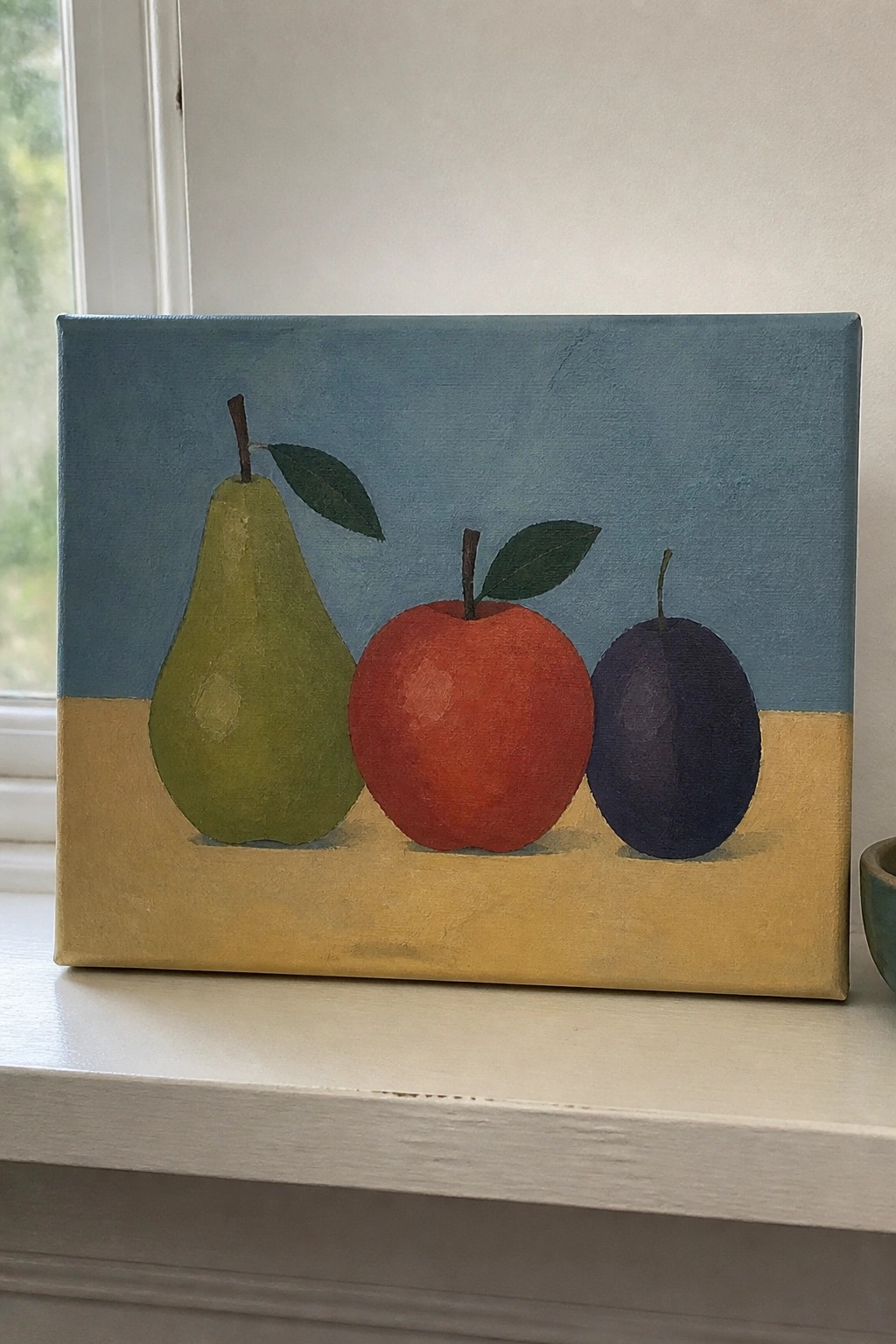 A small oil painting of a green pear, red apple, and dark purple plum arranged on a yellow ledge against a blue wall.
