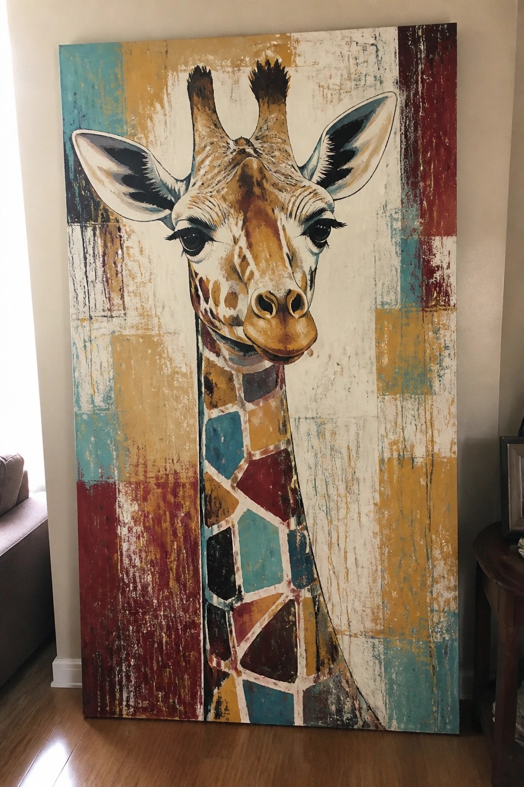 Colorful abstract giraffe painting with patchwork neck and distressed geometric background
