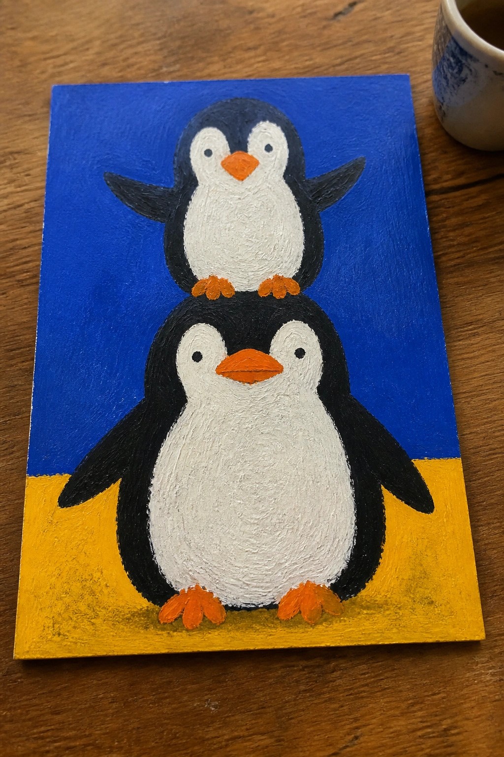Thickly painted penguins stacked together on blue and yellow canvas background.