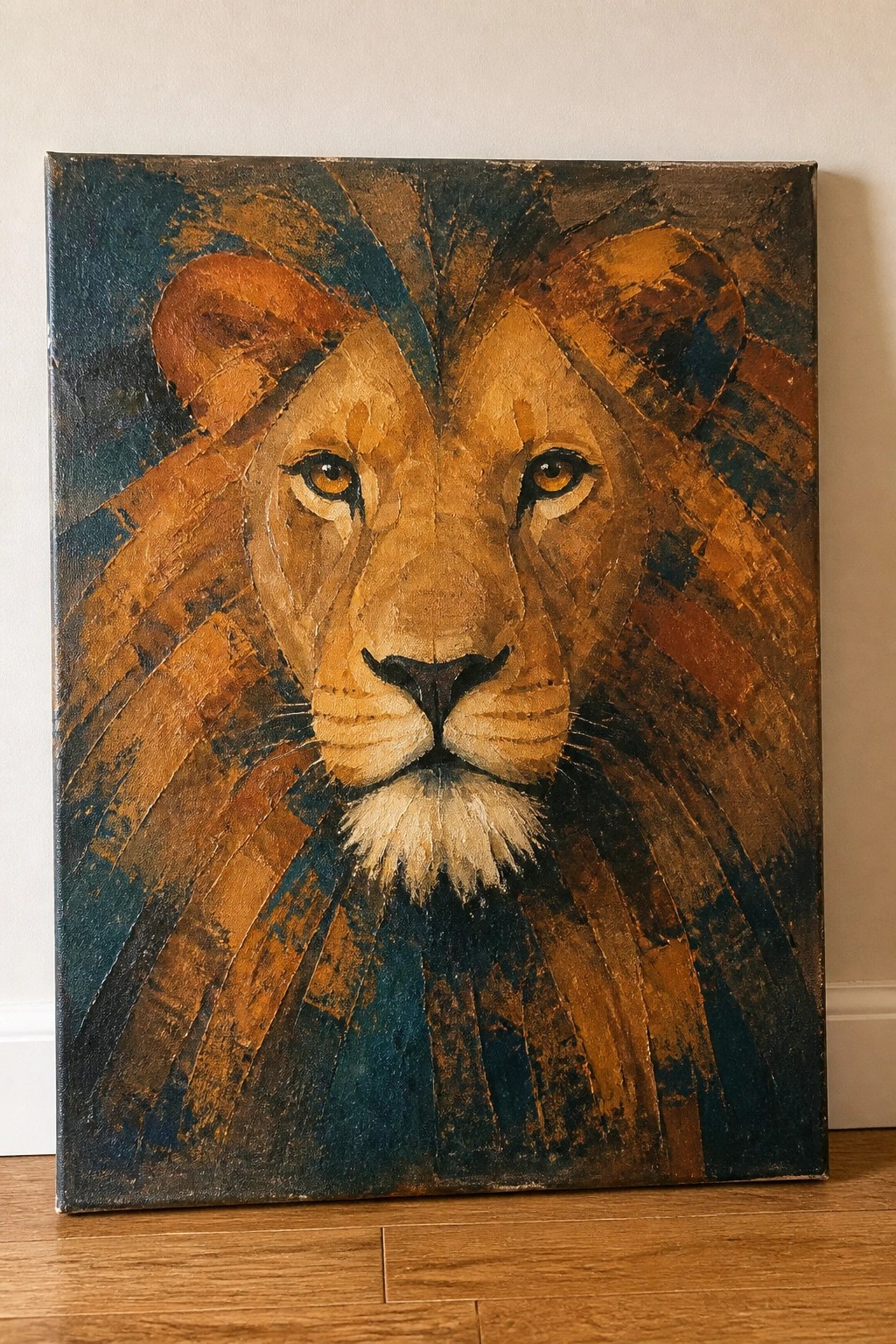 Abstract lion painting with golden eyes, brown-orange fur and teal mane strokes