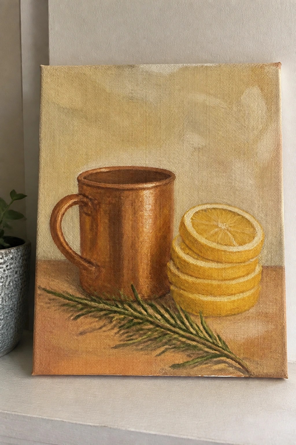 Still life painting of copper mug, stacked lemon slices, and rosemary sprig on wood.
