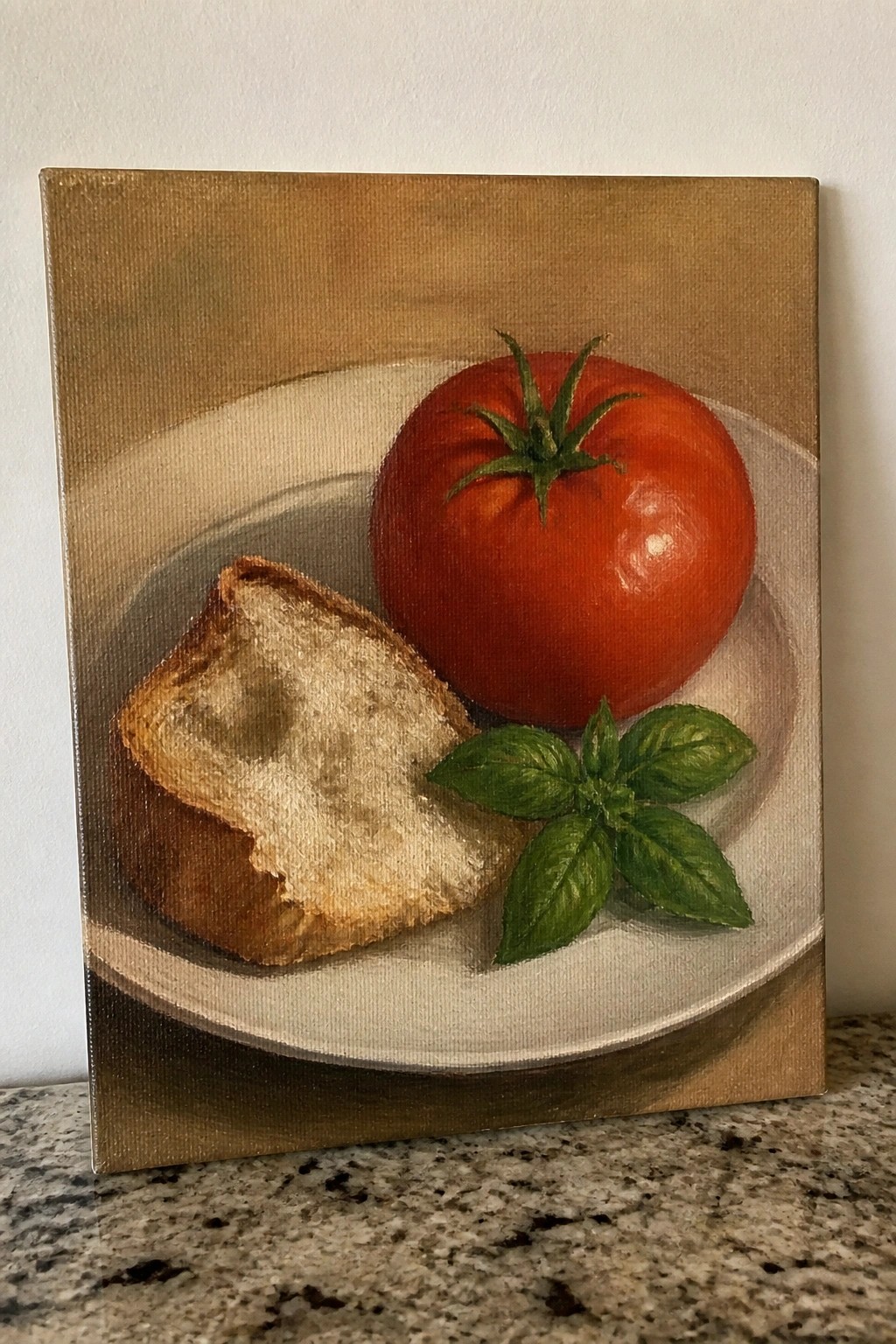 Still life painting of red tomato, bread slice, and basil on white plate