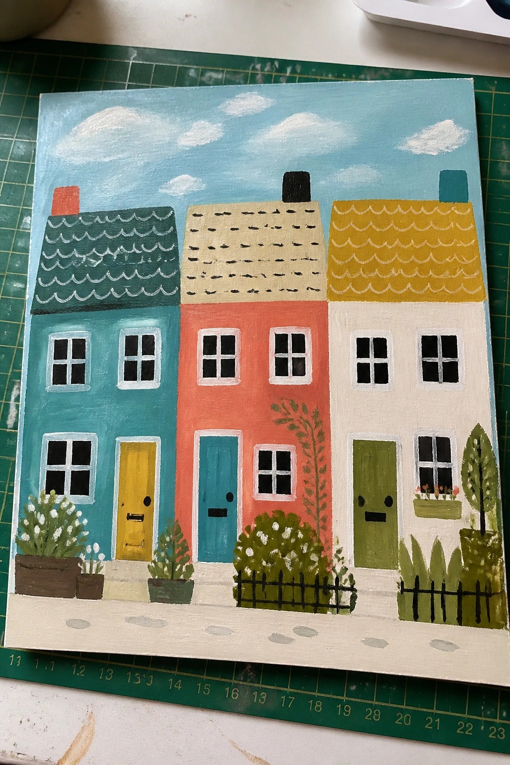 Colorful folk-art painting of row houses with wavy roofs, bright doors and plants.