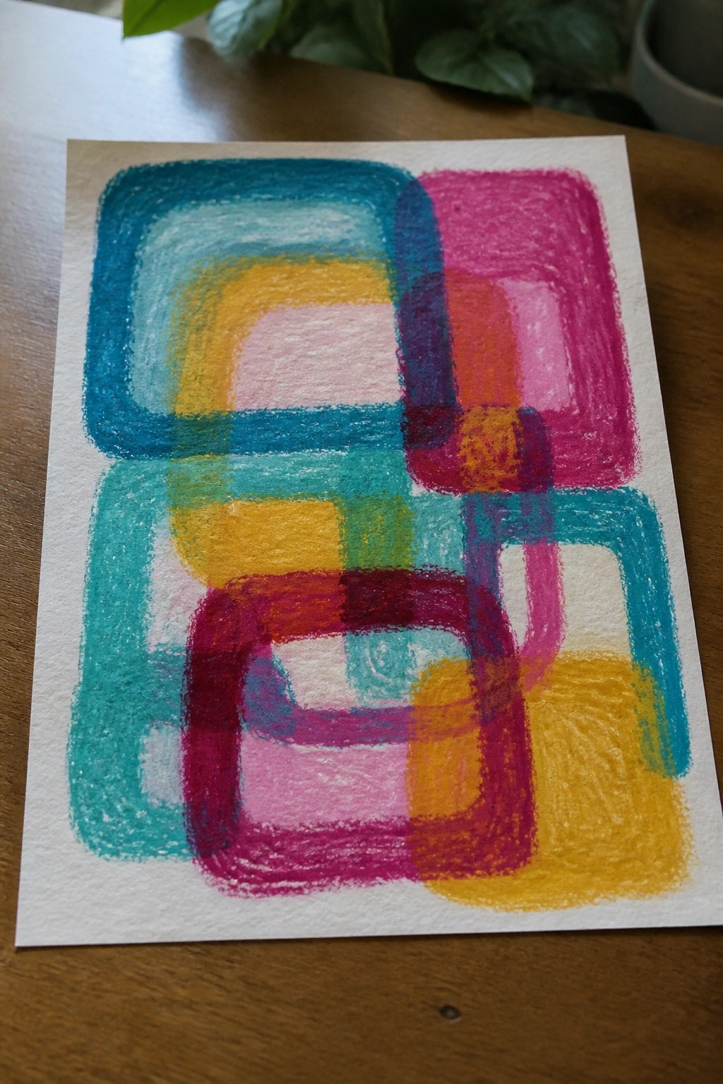 Vibrant abstract artwork of overlapping colorful squares in pastel on white paper
