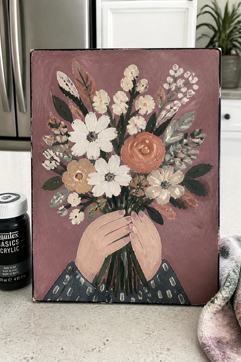 Acrylic painting of hands in polka-dot sleeves holding a floral bouquet on mauve background