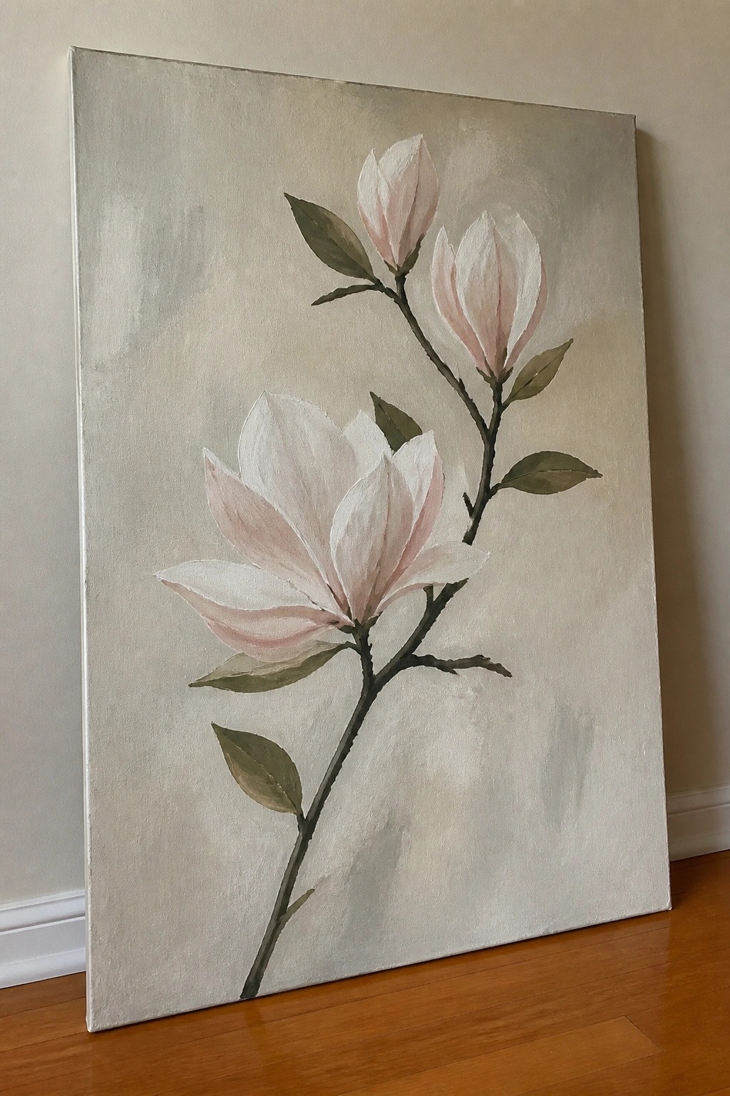 Painting of white and pink magnolias with green leaves on beige canvas