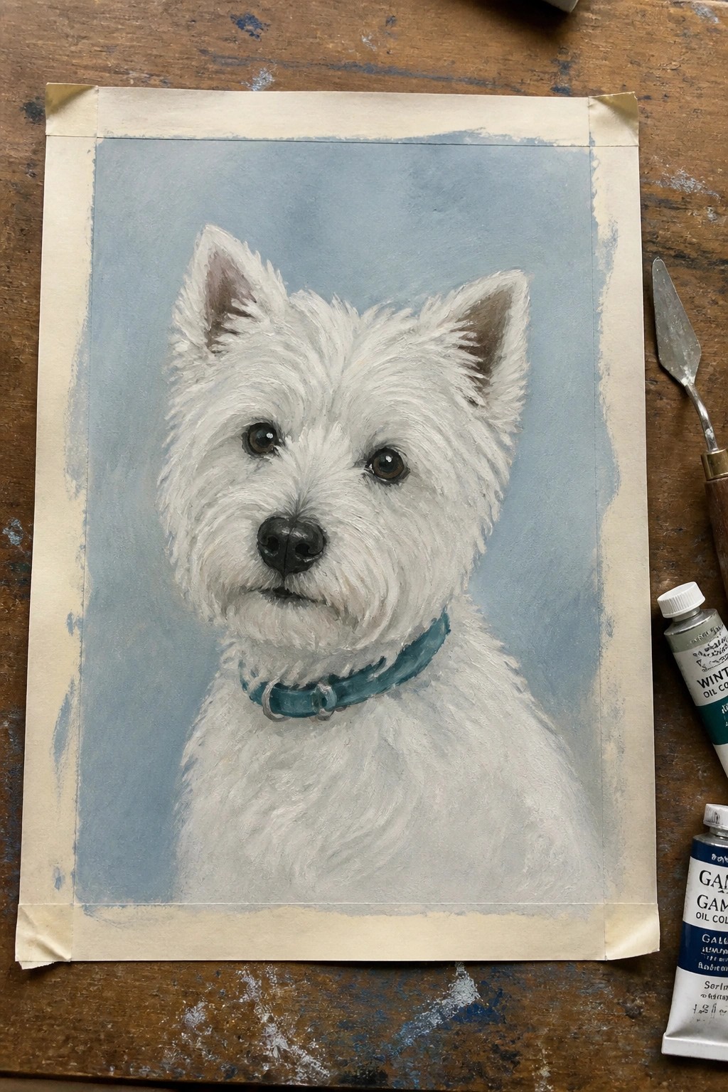 A realistic oil painting of a white terrier with a teal collar against a soft blue background, taped to a wooden surface with paint tubes nearby.