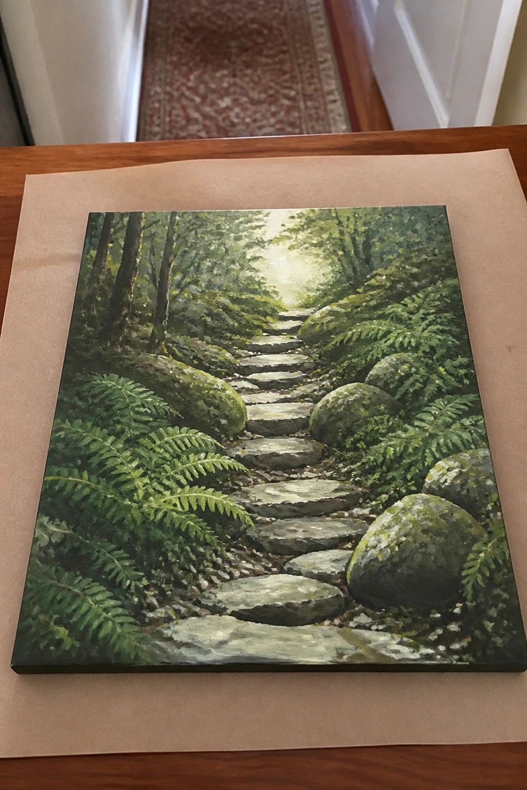 Realistic painting of mossy stone steps ascending through sunlit fern-filled forest.